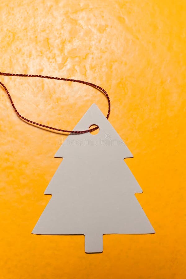 White Christmas Tree Ornament on Yellow Background Stock Image Image