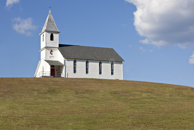 White church on hill stock photo White church on hill stock photo
