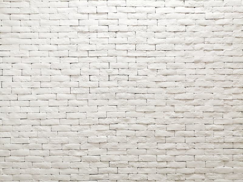White clay brick wall facade interior design for pattern wallpaper, background and backdrop.