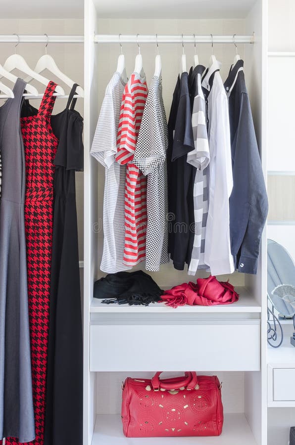 White Closet with Shirt and Dress Hanging Stock Image - Image of wardrobe, lifestyle: 49583961