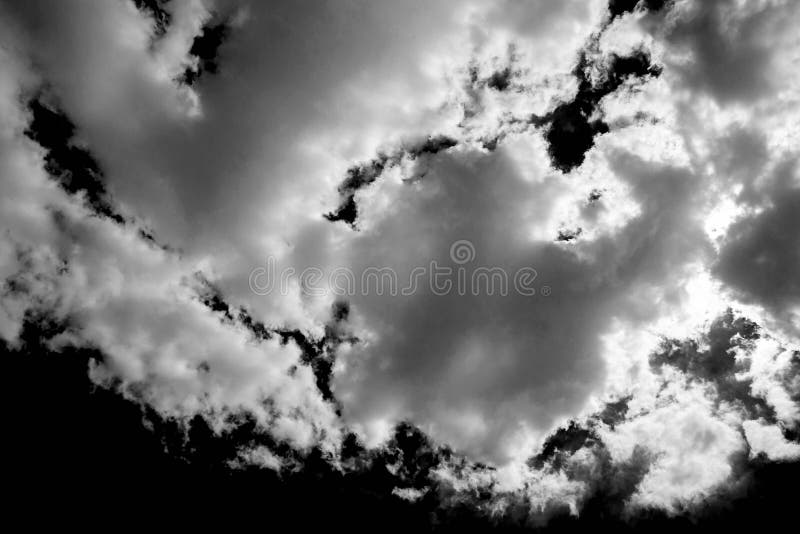 White Cloud on a Black Background. Dramatic Clouds Stock Photo Image