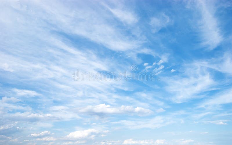 White clouds on blue sky. Day.