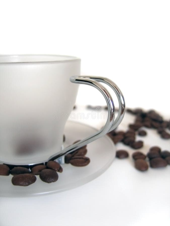 White coffee cup with beans