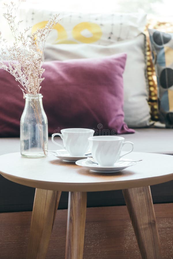 White Coffee Cup with Flower Vase on Table Decoration with Pillow on Sofa Stock Image Image of