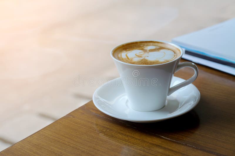 https://thumbs.dreamstime.com/b/white-coffee-cup-wood-desk-morning-84318869.jpg