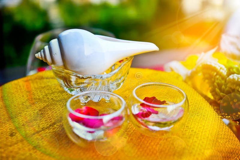 White conch shell and water bowl set for water Blessing in wedding day. stock photography