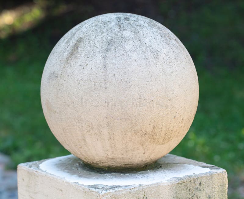 White Concrete Ball on the Fence Stock Photo Image of nature, rough