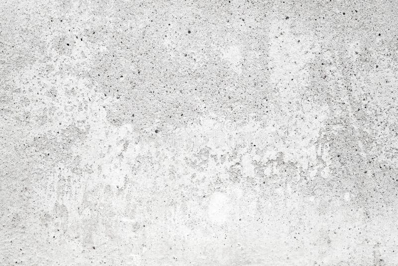 White concrete wall with stucco, background texture