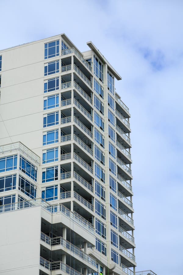 White condos with Blue Terraces