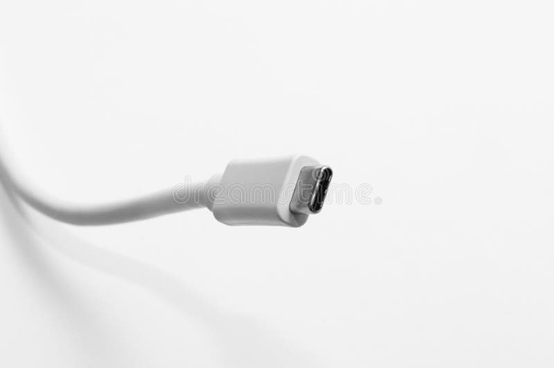 White Cord with USB-C Connection. Infront of White Background with shadow.