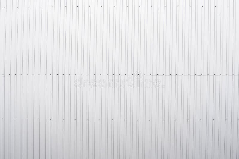 White Corrugated Metal Sheet Texture Surface of the Wall. Galvanize Steel Background. Stock