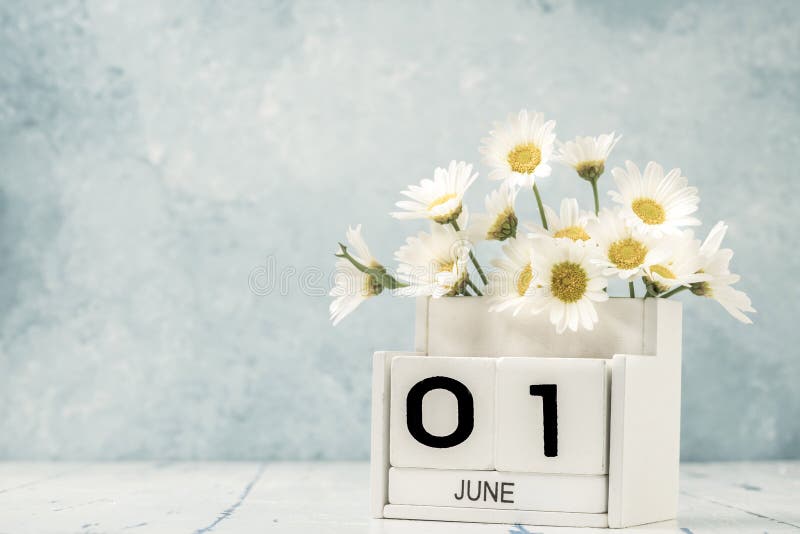 White Cube Calendar for June Decorated with Daisy Flowers Stock Photo ...