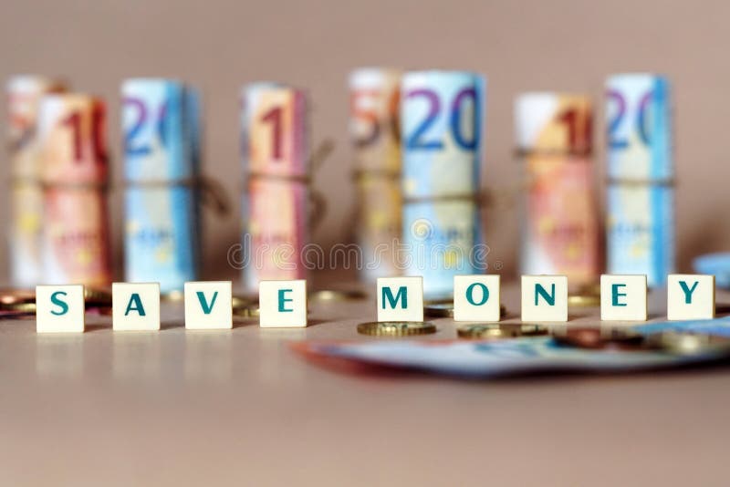 Cubes Spelling Save Money on the Table with Spanish Dinero Bills and Coins Stock Image Image