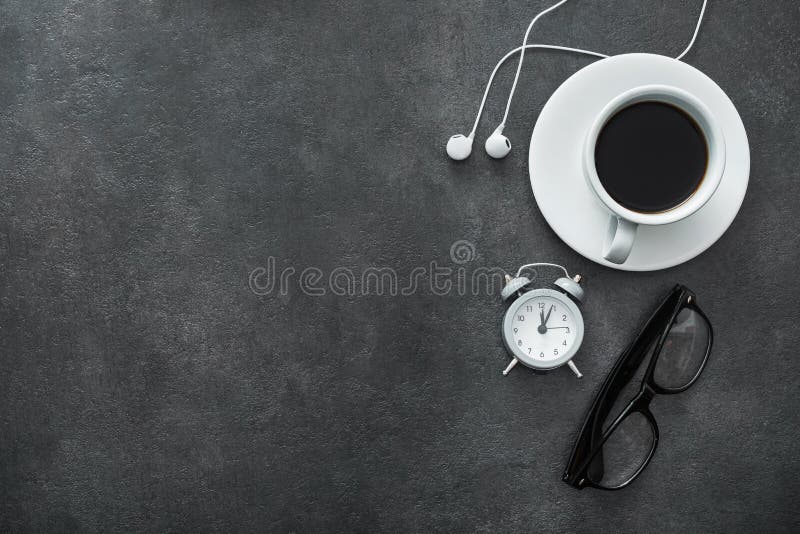 White cup of coffee with headphone