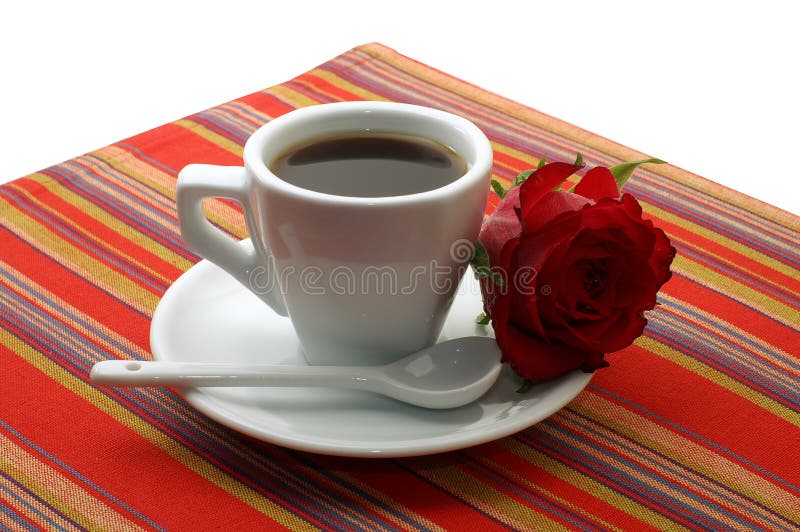 White cup of coffee with a red rose