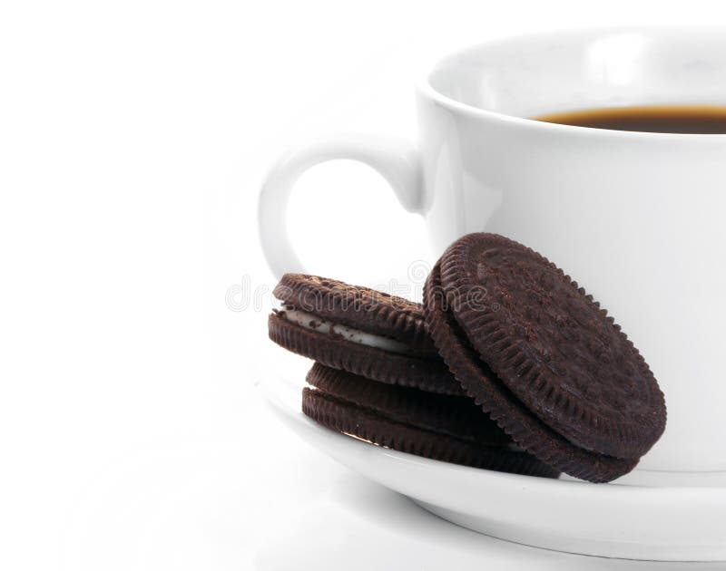 White cup of dark coffee and chocolate cookies