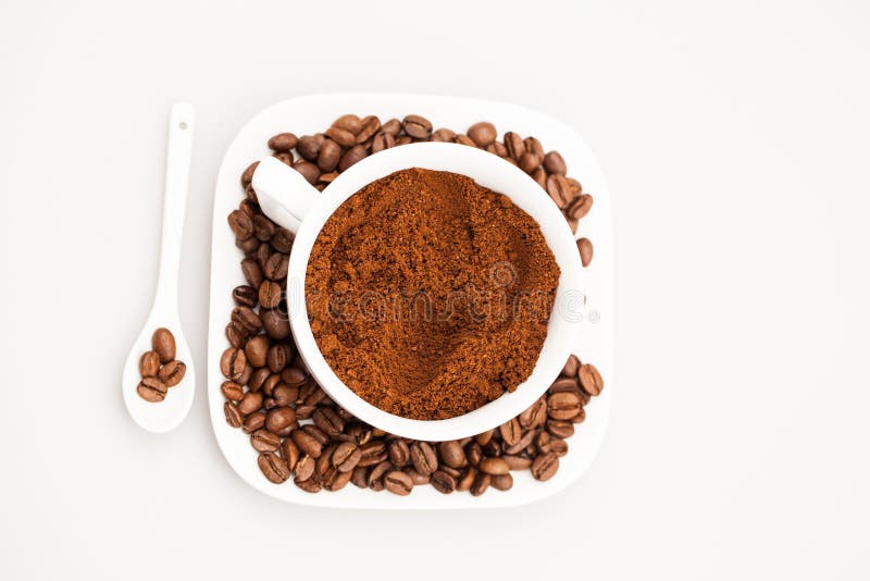 White Cup and Teaspoon, Coffee Beans and Coffee Powder Stock Image