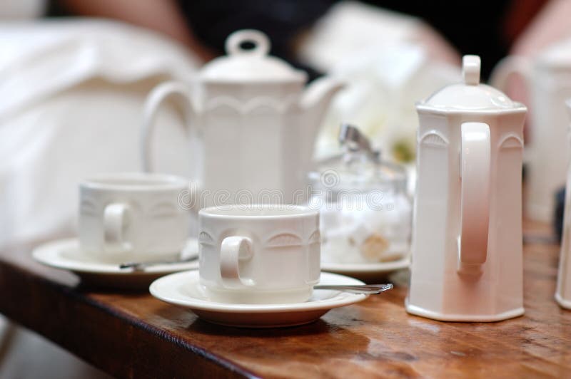 White cups and teapot set stock image. Image of cafe 16375867