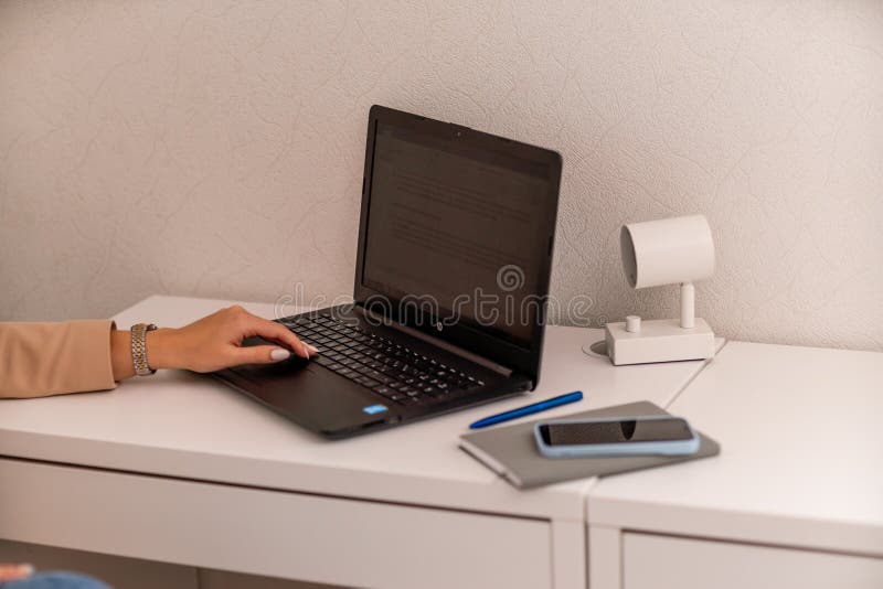 White Desktop with Laptop for Remote Work or Study. Office Computer