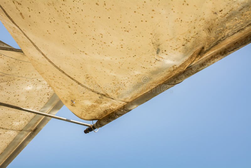White dirty canopy under the blue sky royalty free stock images White dirty canopy under the blue sky royalty free stock images