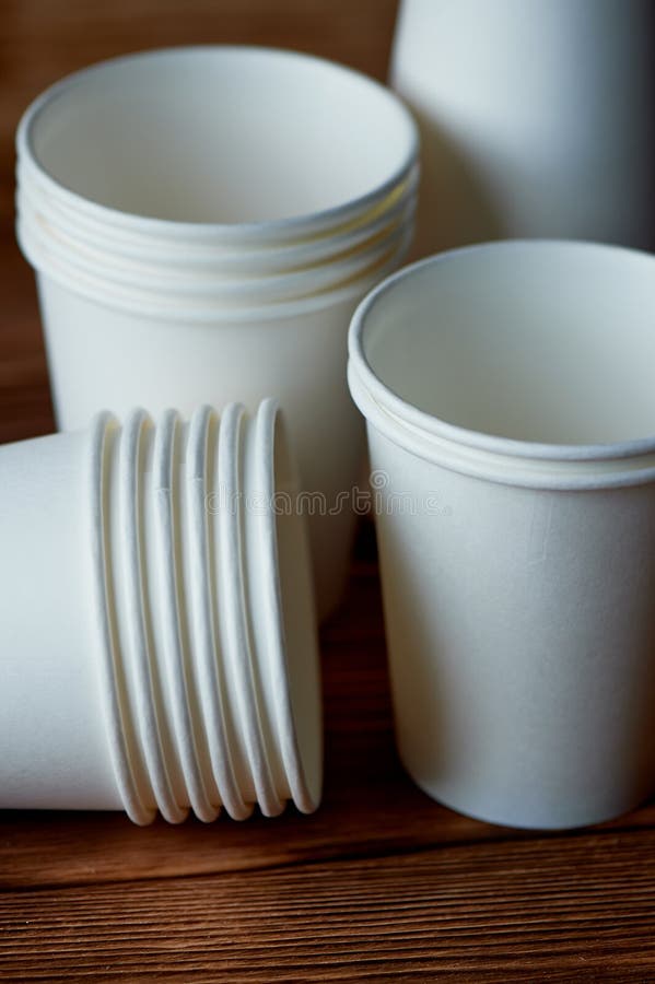 White Disposable Paper Cups for Coffee and Tea.a Lot. Stock Photo