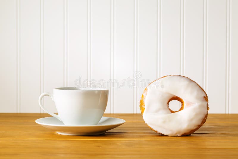 White Donut with Coffee on a Wooden Table Stock Photo Image of icing