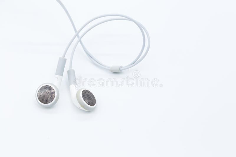 White earbuds isolated on white background