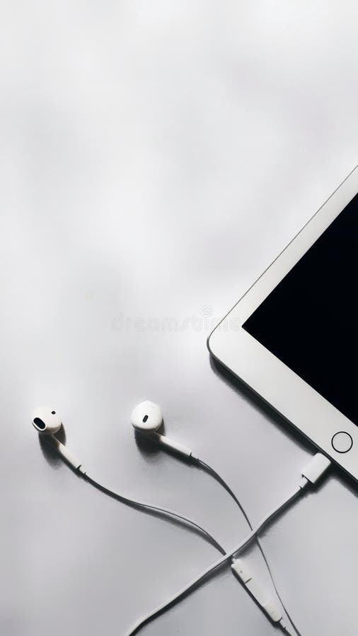 White Earphones, with IPad and Headphones Wallpapers in White Background.  Wallpaper Photos. Stock Image - Image of monochrome, earphone: 209412075