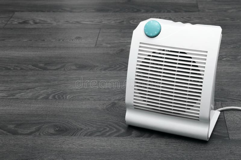 White Electric Heater on the Floor Stock Image Image of laminate