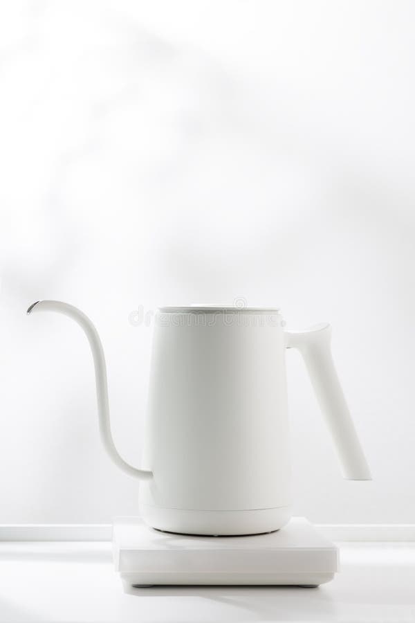 White electric kettle. stock photo. Image of body, vertical 267421180
