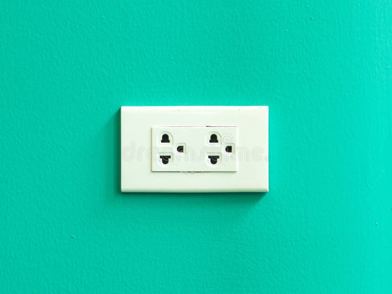 White Electric Outlet Mounted on Green Wall Stock Photo Image of