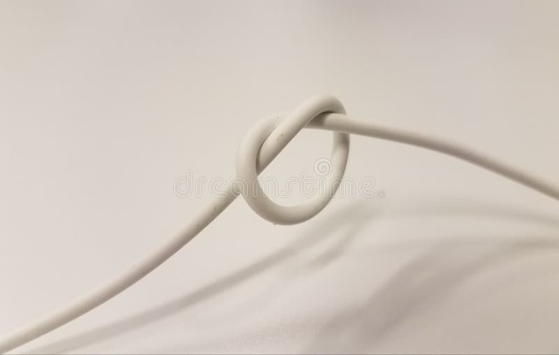 White Electrical Cable with Knot on White Surface Stock Image Image