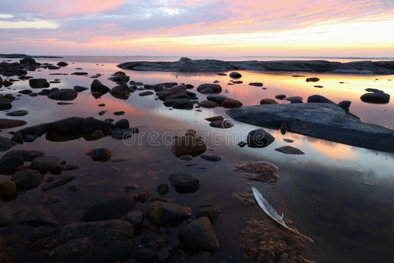 White Feather Sunset Rocky Coastline