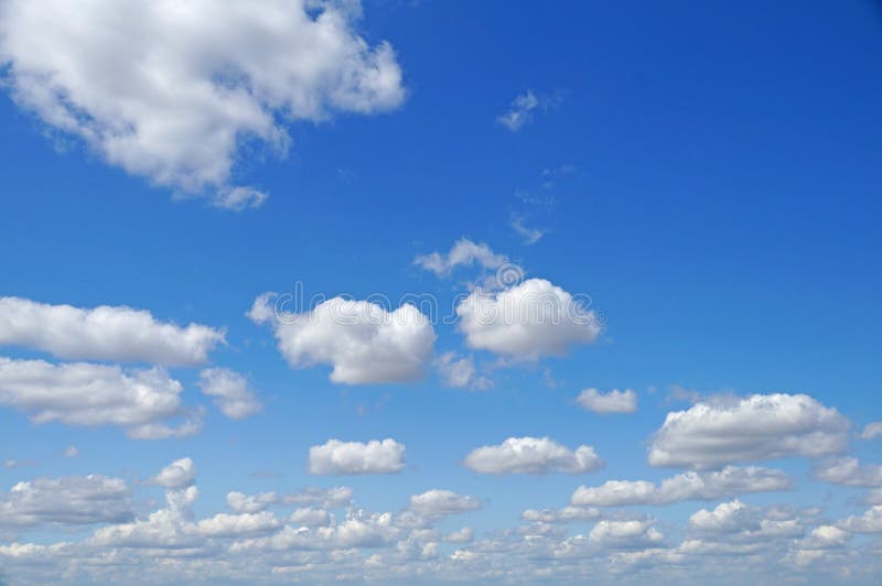 White fluffy clouds stock photo. Image of high, rays 98683380