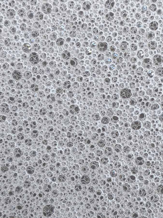 White foam texture background, soap bubbles on the water royalty free stock photos White foam texture background, soap bubbles on the water royalty free stock photos