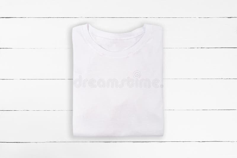 Download White Folded Blank T-shirt On White Wooden Background. White Tshirt Design Template Stock Image ...