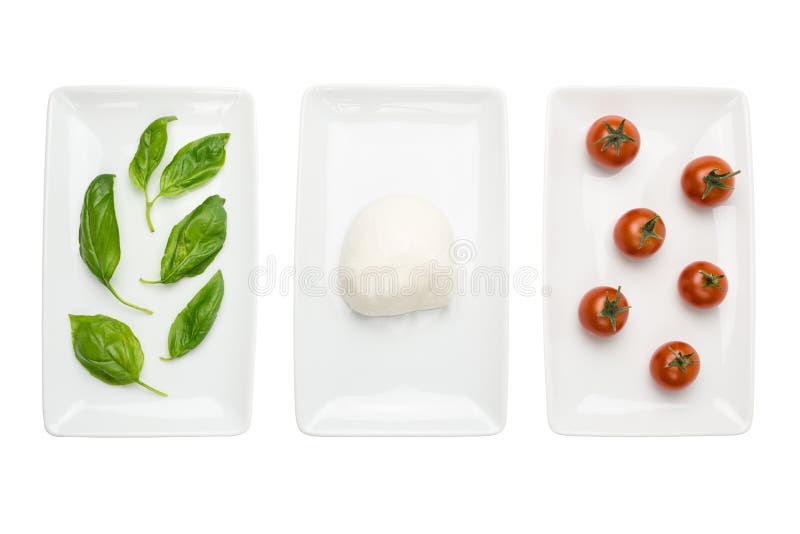 white för tomat för mozzarella för basilikaflaggamat italiensk royaltyfria bilder white för tomat för mozzarella för basilikaflaggamat italiensk royaltyfria bilder