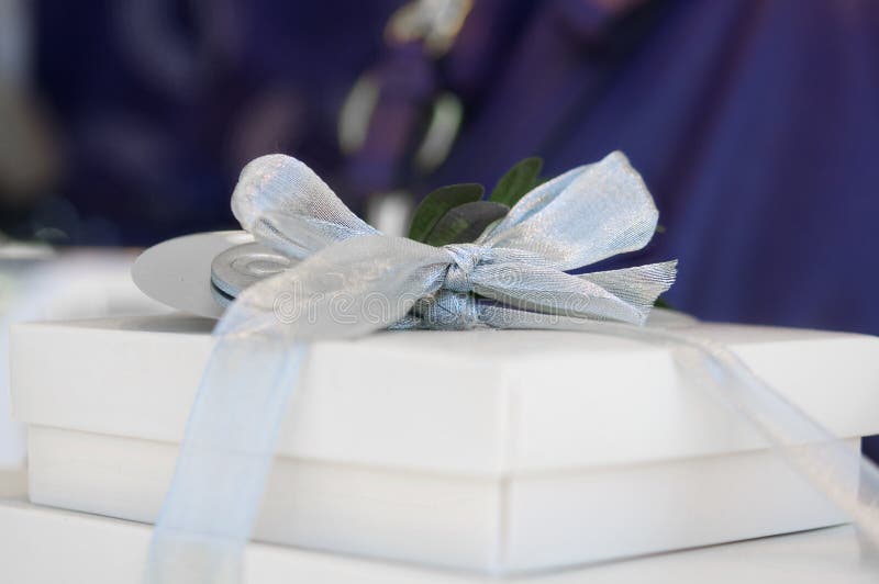 White gift boxes with bow and ribbon