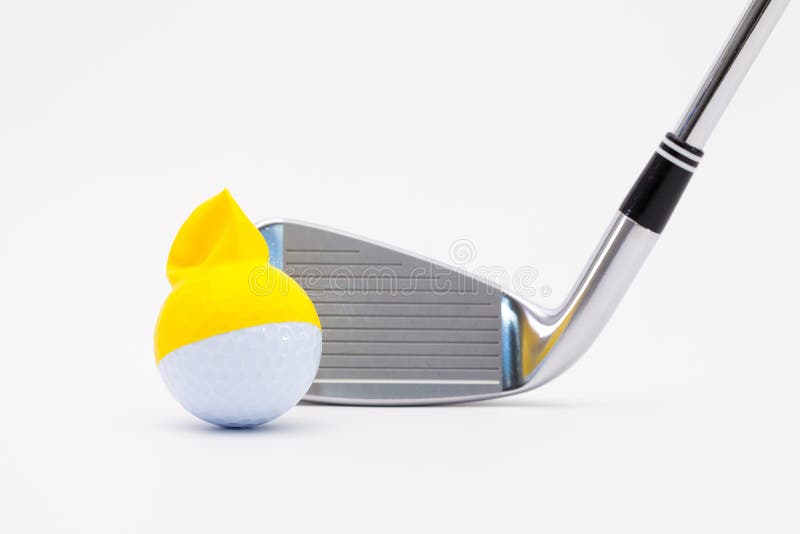 White Golf Ball With Funny Cap And Golf Club On The White Background. Stock Photo Image of