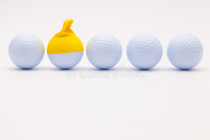 White Golf Balls With Funny Cap On The White Background. Stock Image Image of background, copy