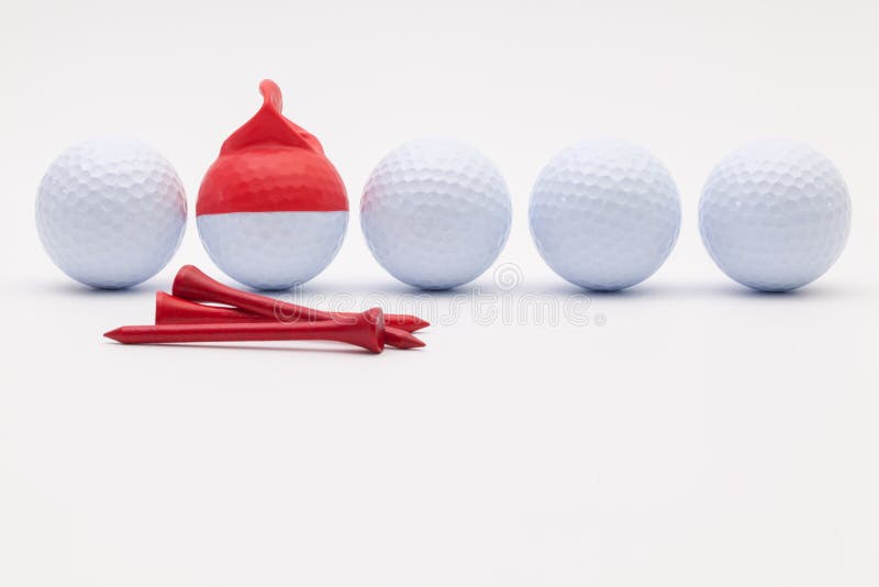 White Golf Balls With Funny Cap On The White Background. Stock Photo Image of blank, activity