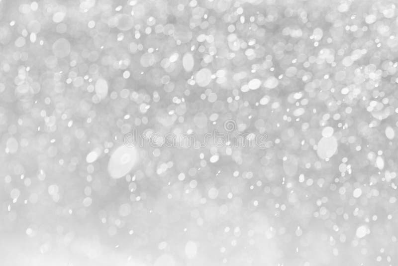 White Gray bokeh background. Abstract sparkles particle moving small large defocus different overlay blend screen modes royalty free stock photos