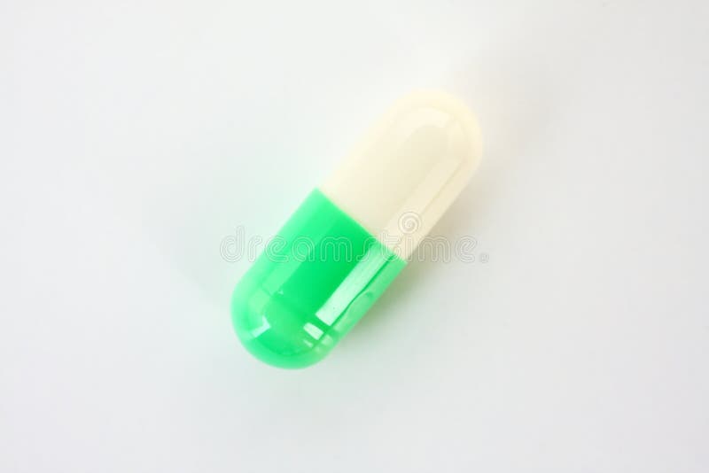 White green capsule. stock image. Image of capsule, drug 16738027