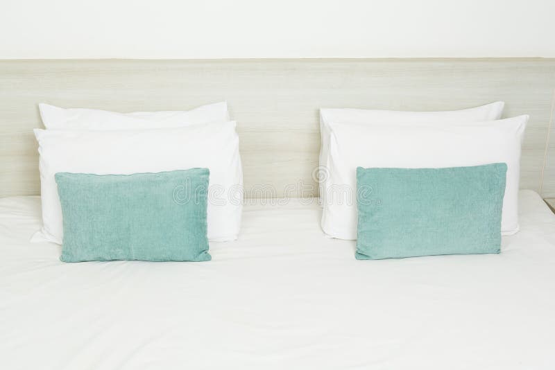 White And Green Pillows On Bed Stock Photo Image of lamp, business