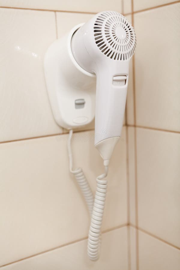White Hair Dryer Hanging on Wall in Bathroom Stock Photo Image of