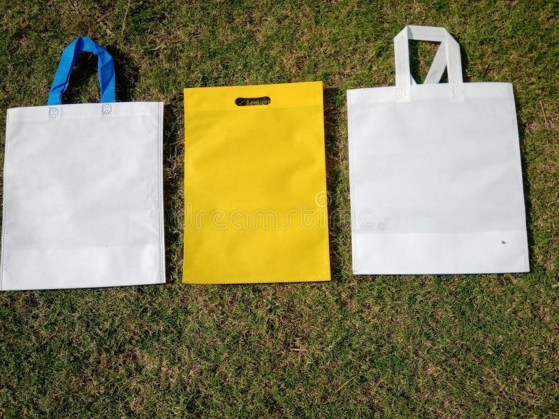 White Handle Loop and Yellow Color D Cut Eco Friendly Bags, Non Woven