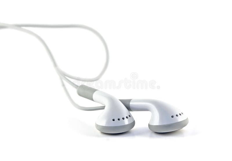 White MP3 Player Headphones Over White. White MP3 Player Headphones Over White