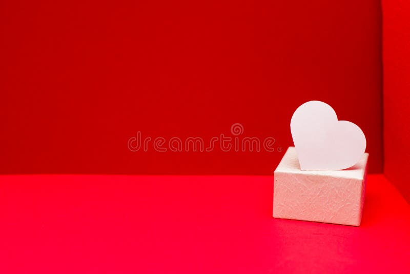 White Heart Of Paper On Red Background For Happy San Valentine Day. Happy Mother`s Day