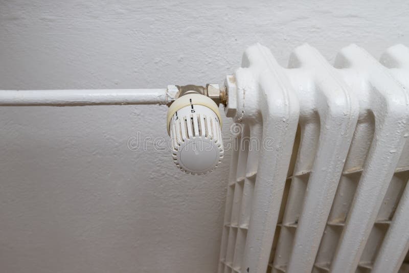 White Heating Radiator with Heat Regulation Valve Stock Photo Image