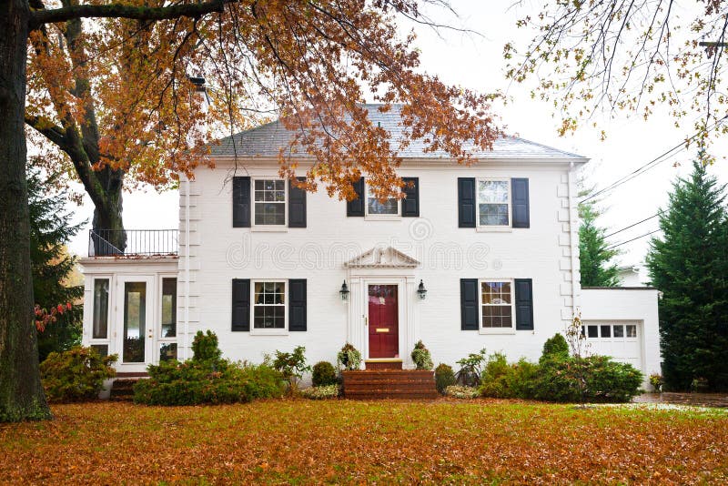 White Home With A Red Door Stock Photo. Image Of Garage - 27413746